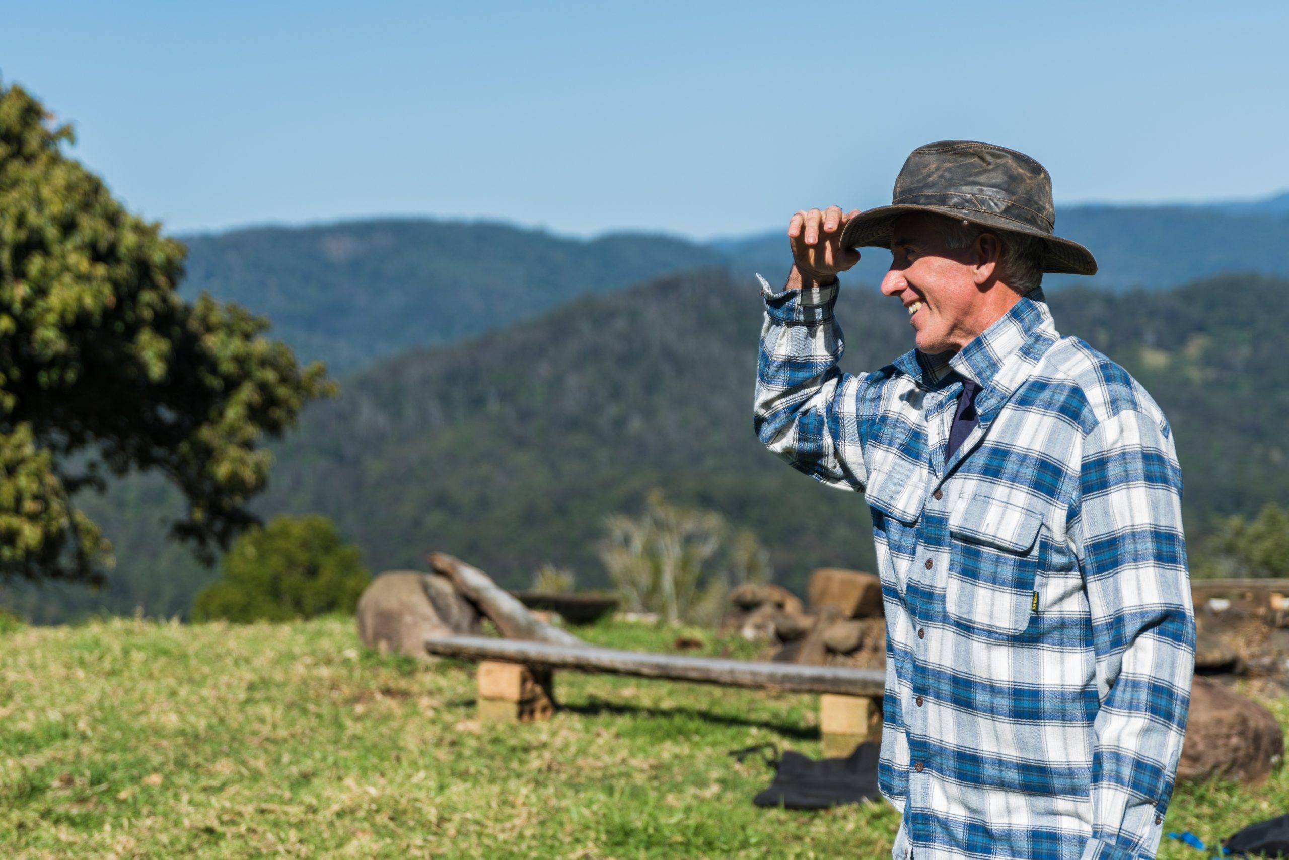 man-wearing-blue-and-white-checked-sport-shirt-and-black-hat-1482101